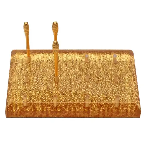 Stojalo za brusilne nastavke zlate barve