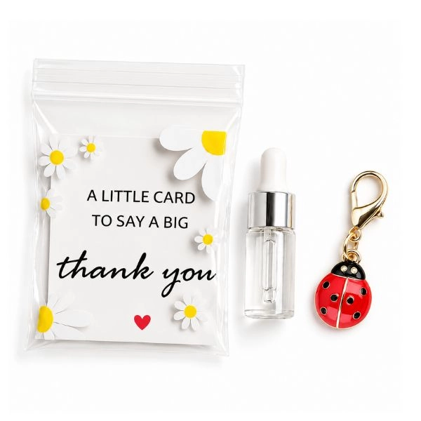 Darilno pakiranje Cuticle Oil Almond + obesek za ključe