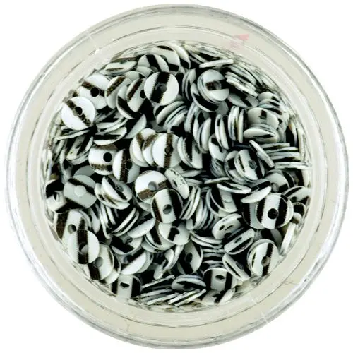 Bleščeči beli diski s črnimi črtami